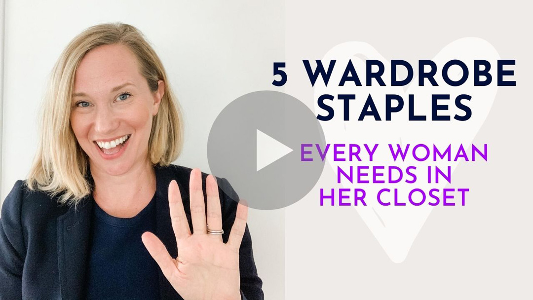 5 Wardrobe Staples Every Woman Needs in her Closet with woman holding up five fingers in navy blazer and t-shirt smiling